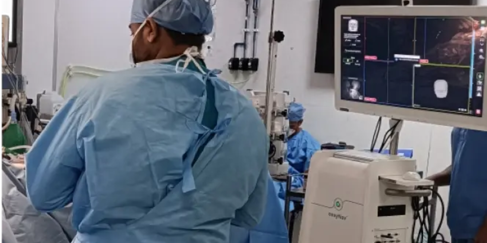 A surgical team utilizing a neuro navigation machine with real-time imaging for enhanced precision.